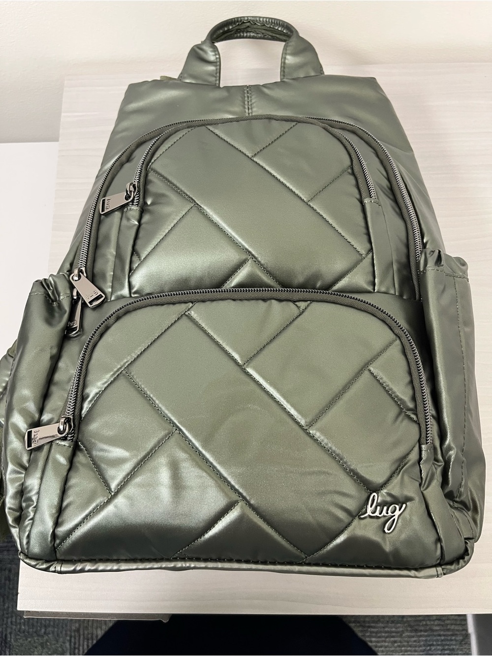 Lug Hatchback 3 - Backpack
Color.  Olive Green - NWT